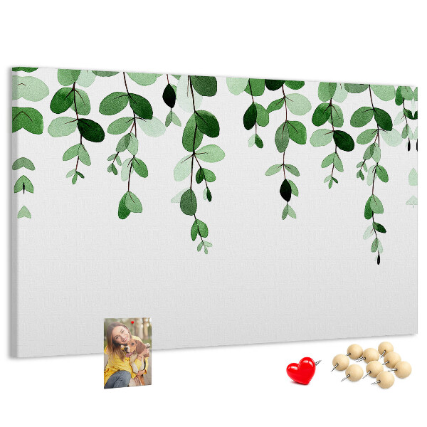Prikbord met een print van groene bladeren in een verfijnde aquareltechniek