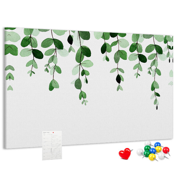 Prikbord met een print van groene bladeren in een verfijnde aquareltechniek