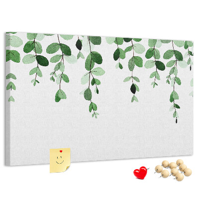 Prikbord met een print van groene bladeren in een verfijnde aquareltechniek