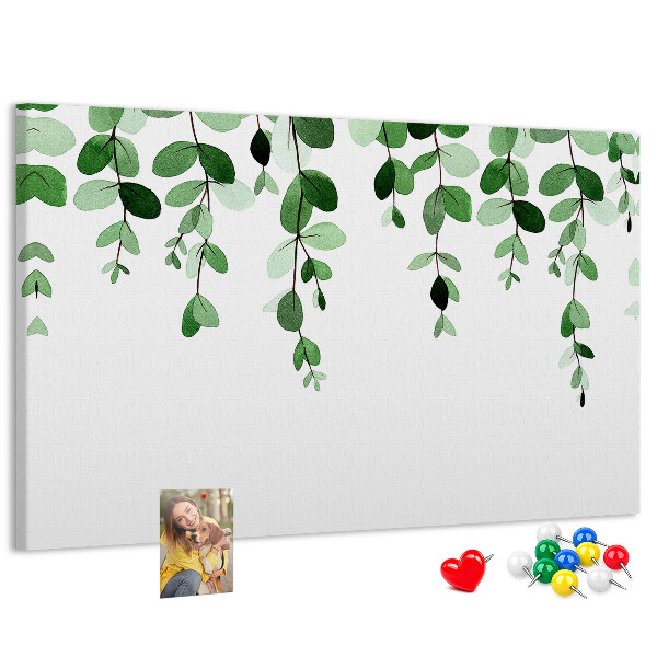 Prikbord met een print van groene bladeren in een verfijnde aquareltechniek