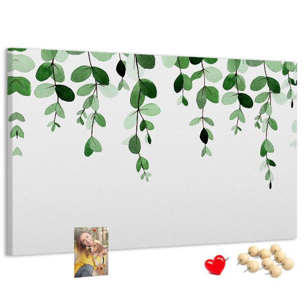 Prikbord met een print van groene bladeren in een verfijnde aquareltechniek