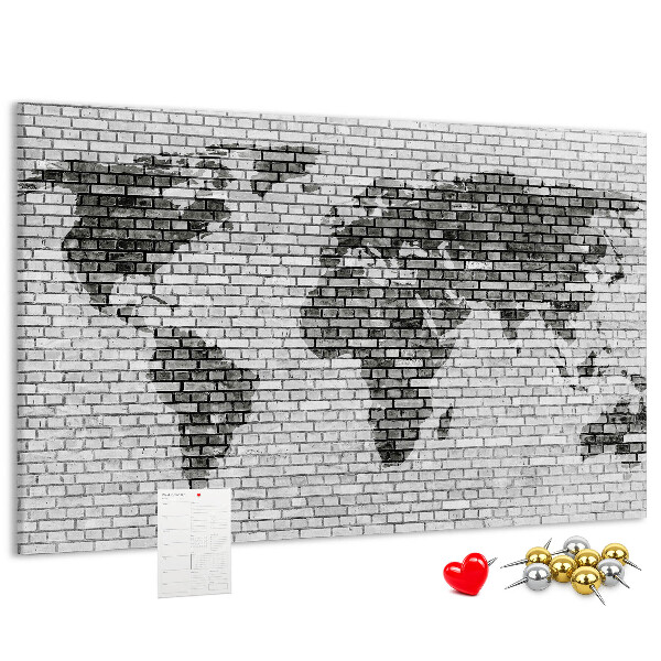 Wereldkaart op een bakstenen muur prikbord