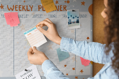 Kurk prikbord met kosmisch weekschema en sterrenmotief