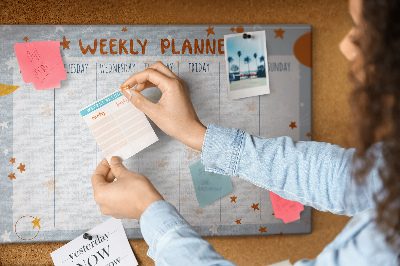 Kurk prikbord met kosmisch weekschema en sterrenmotief