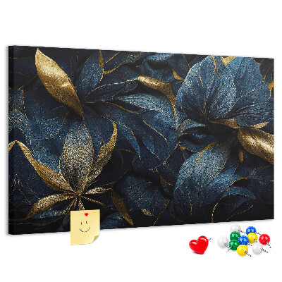 Kurkbord met gouden bladeren op een donkerblauwe achtergrond