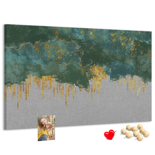 Prikbord met gouden druppels op een blauwe wolkenachtergrond