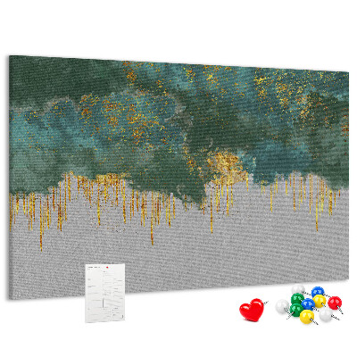 Prikbord met gouden druppels op een blauwe wolkenachtergrond