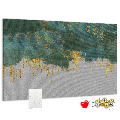 Prikbord met gouden druppels op een blauwe wolkenachtergrond