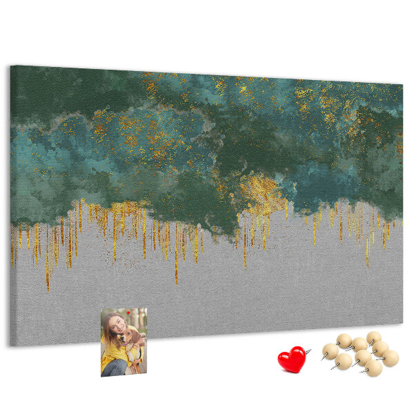 Prikbord met gouden druppels op een blauwe wolkenachtergrond