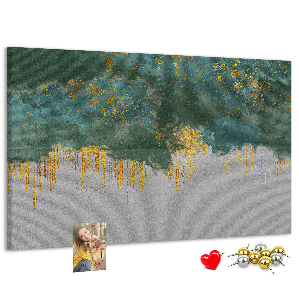 Prikbord met gouden druppels op een blauwe wolkenachtergrond