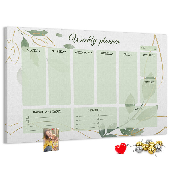 Prikbord groene weekplanner met plantenaccenten
