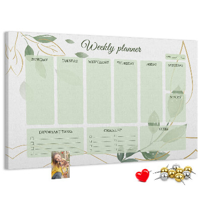 Prikbord groene weekplanner met plantenaccenten