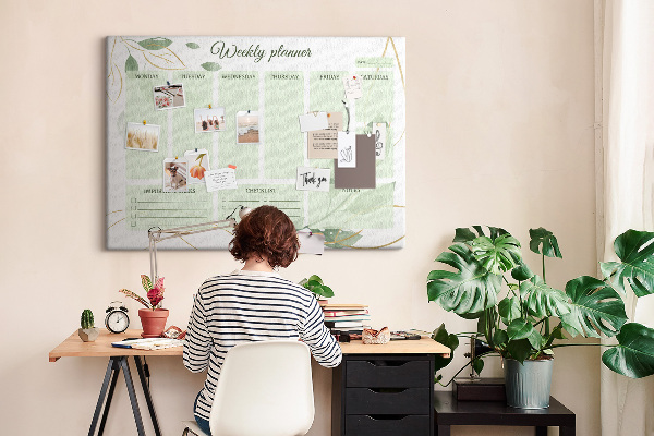 Prikbord groene weekplanner met plantenaccenten