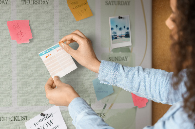 Prikbord groene weekplanner met plantenaccenten