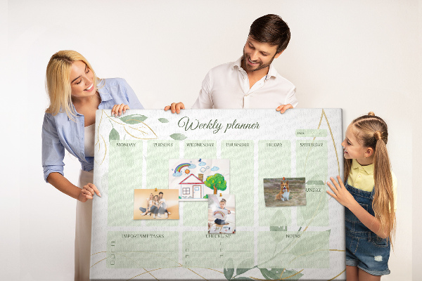 Prikbord groene weekplanner met plantenaccenten