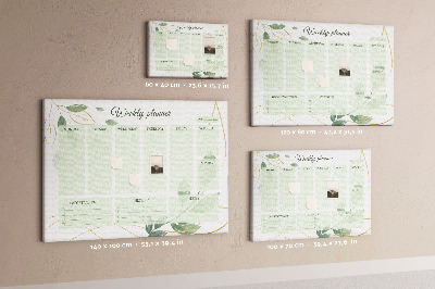 Prikbord groene weekplanner met plantenaccenten