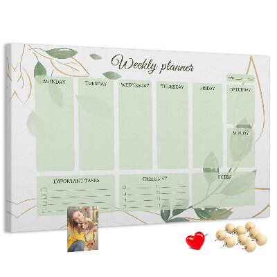 Prikbord groene weekplanner met plantenaccenten