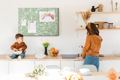 Prikbord met bladmotief en fijne lijnen