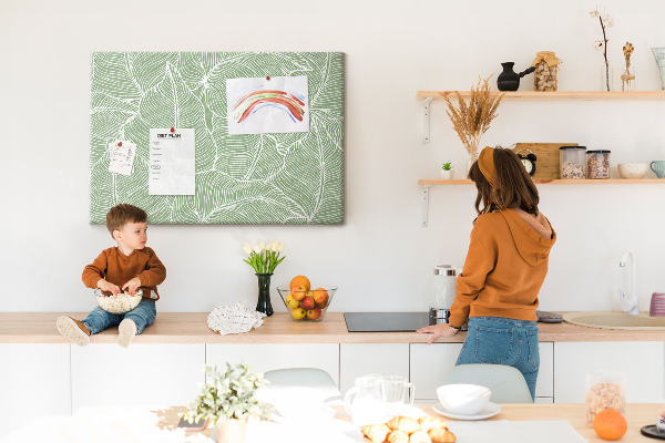 Prikbord met bladmotief en fijne lijnen