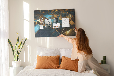 Prikbord met gouden en blauwe geometrische vormen