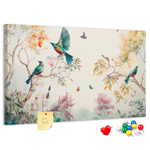 Prikbord met een afbeelding van kleurrijke vogels in een lentelandschap