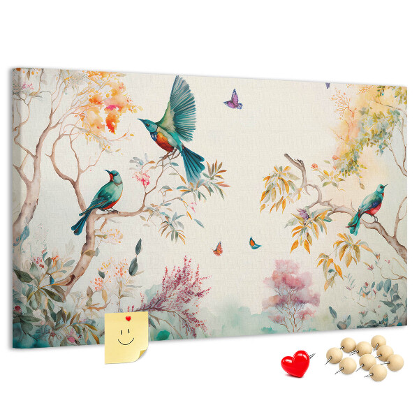 Prikbord met een afbeelding van kleurrijke vogels in een lentelandschap