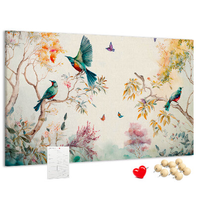 Prikbord met een afbeelding van kleurrijke vogels in een lentelandschap
