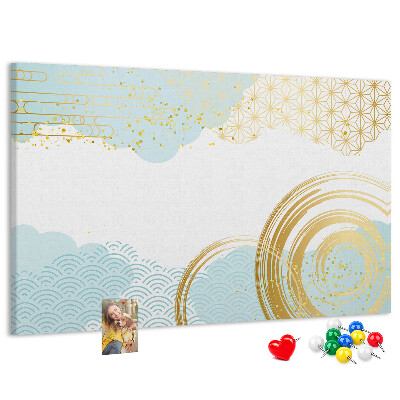 Prikbord met gouden spiralen op een blauwe achtergrond