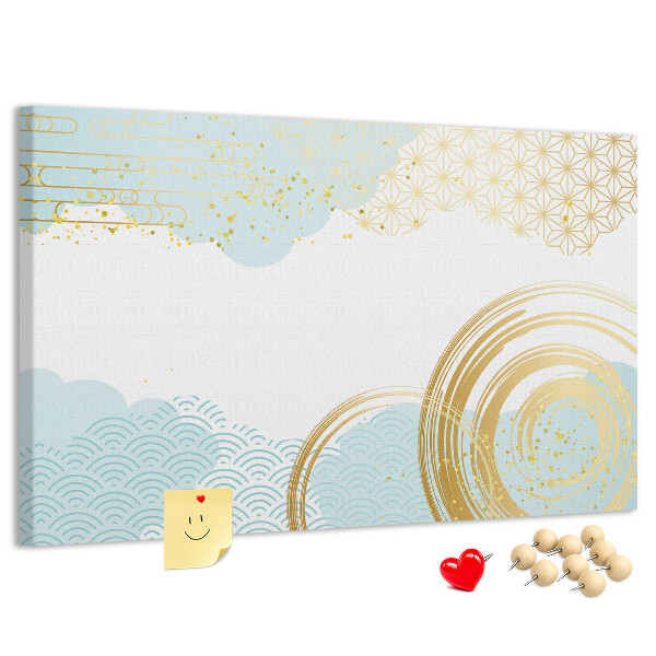 Prikbord met gouden spiralen op een blauwe achtergrond