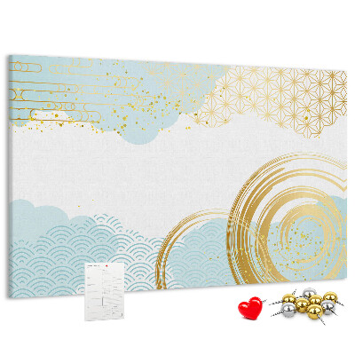Prikbord met gouden spiralen op een blauwe achtergrond