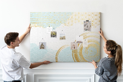 Prikbord met gouden spiralen op een blauwe achtergrond