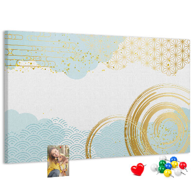 Prikbord met gouden spiralen op een blauwe achtergrond