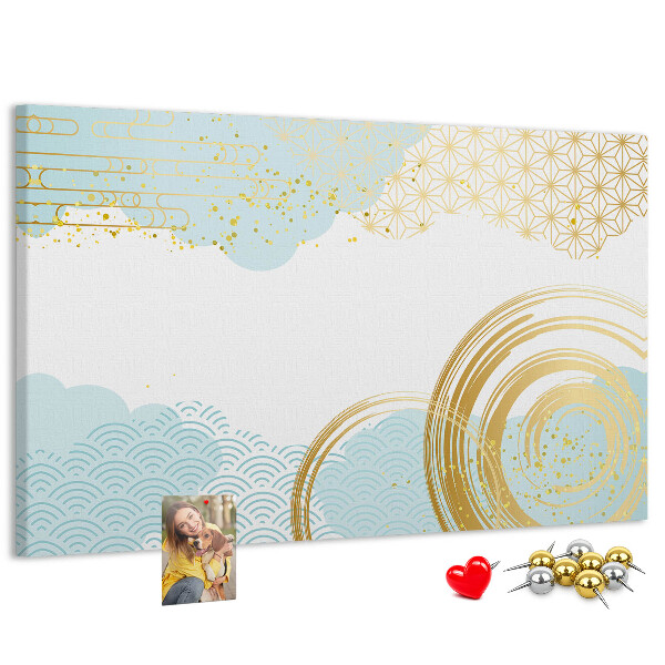 Prikbord met gouden spiralen op een blauwe achtergrond