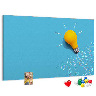 Prikbord met gloeiende lamp met explosie-effect