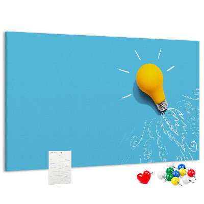 Prikbord met gloeiende lamp met explosie-effect