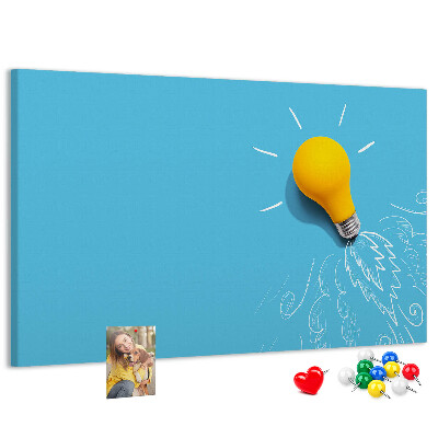 Prikbord met gloeiende lamp met explosie-effect