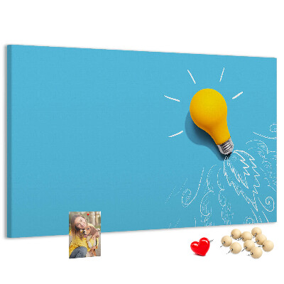 Prikbord met gloeiende lamp met explosie-effect
