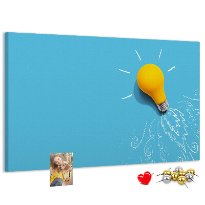 Prikbord met gloeiende lamp met explosie-effect