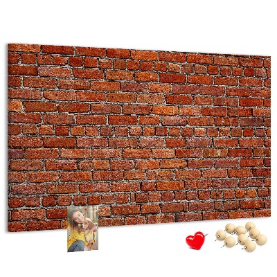 Kurk prikbord met een print van een bakstenen muur in warme tinten