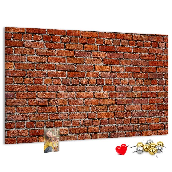 Kurk prikbord met een print van een bakstenen muur in warme tinten