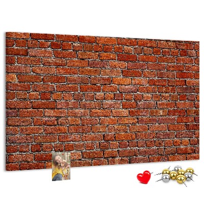 Kurk prikbord met een print van een bakstenen muur in warme tinten