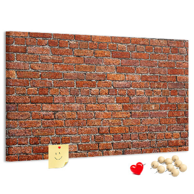 Kurk prikbord met een print van een bakstenen muur in warme tinten