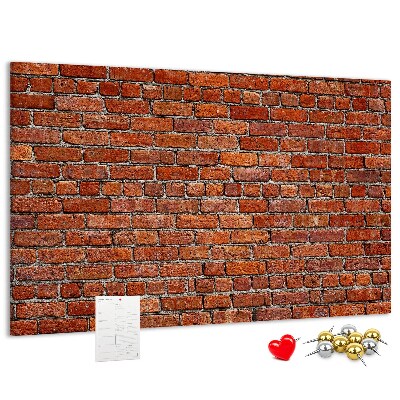 Kurk prikbord met een print van een bakstenen muur in warme tinten