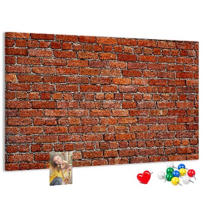 Kurk prikbord met een print van een bakstenen muur in warme tinten