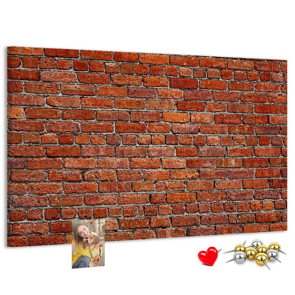 Kurk prikbord met een print van een bakstenen muur in warme tinten