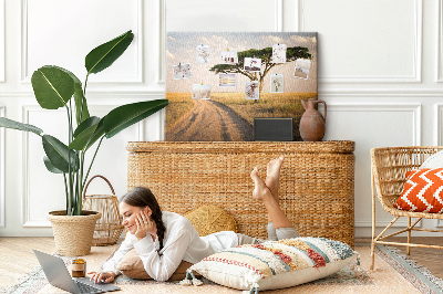 Prikbord met een Afrikaans landschap van een weg met een boom