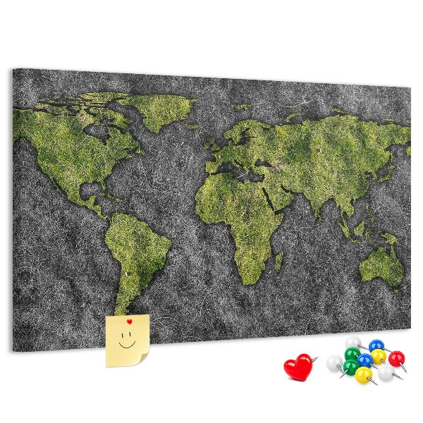 Kurkbord met een groene wereldkaart op een grijze achtergrond