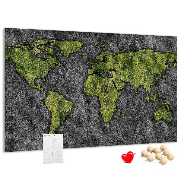 Kurkbord met een groene wereldkaart op een grijze achtergrond