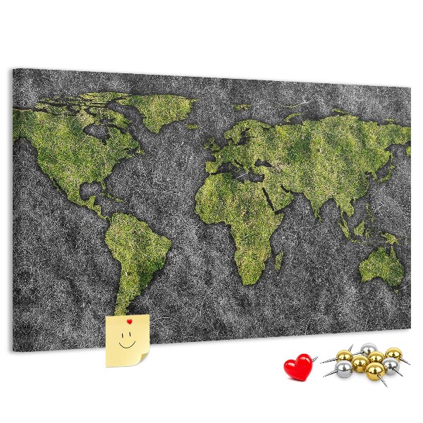 Kurkbord met een groene wereldkaart op een grijze achtergrond