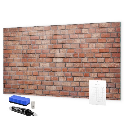 Memobord van glas met print inclusief neodymium magneten Een prikbord aan een bakstenen muur